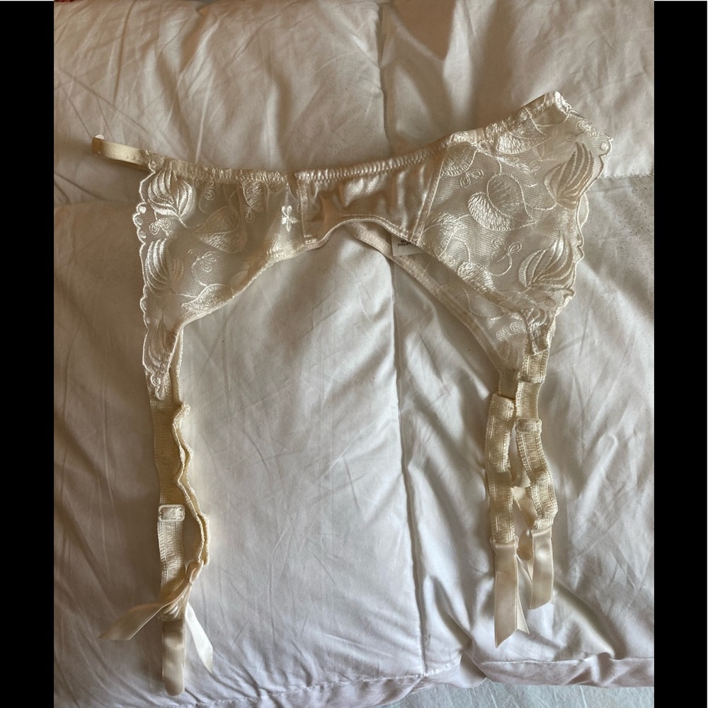 Christian Dior Intimates Small Ivory Garter Belt. I’m not going any lower.